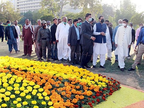 Sindh Law and Environment Adviser Barrister Murtaza Wahab along with Karachi's Administrator Laeeq Ahmed visit Marigold Festival at Frere Hall Park.