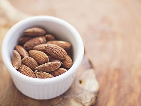 Almonds work by gathering cholesterol from tissues, like the arteries, and helping to transport it out of the body.