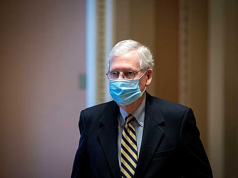 US Senate Minority Leader Mitch McConnell walks to his office after delivering floor remarks at the US Capitol in Washington, US, January 25, 2021.