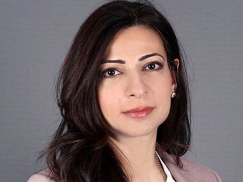 Hana Al Rostamani, Group CEO of the First Abu Dhabi Bank (FAB), climbed two spots to land first place this year.