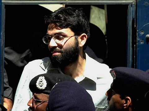 In this March 29, 2002 file photo, Ahmed Omar Saeed Sheikh, the alleged mastermind behind Wall Street Journal reporter Daniel Pearl's kidnap-slaying, appears at the court in Karachi, Pakistan.
