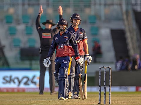 Abdul Shakoor Bangash looks on after hitting another six during his match-winning effort of 73 off 28 balls.