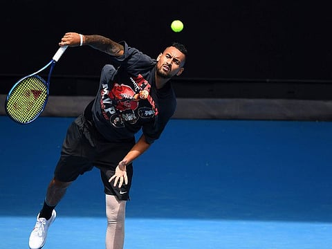Australia's Nick Kyrgios services during a practice session in Melbourne on Saturday