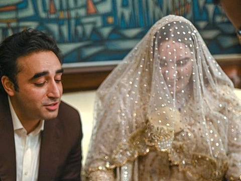 Chairman Pakistan Peoples’ Party Bilawal Bhutto Zardari looks on as his sister Bakhtawar Bhutto Zardari signs Nikahnama (marriage papers) to solemnise her marriage.