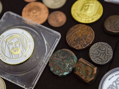Coins displayed at VVK Babu's residence in Dubai.