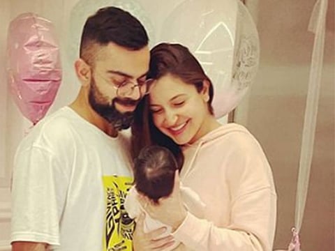 Virat Kohli and Anushka Sharma with baby Vamika