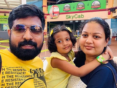 Lucky winner Suraj Aneed with his family