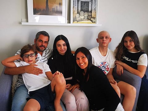 Arthur Castillos, second from right, with his family