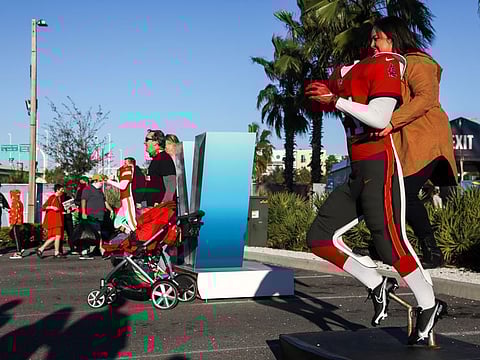 The biggest day for US sport is round the corner as fans pose for pictures at The Super Bowl Experience Presented By Lowe's event ahead of the weekend's Super Bowl LV between the Kansas City Chiefs and Tampa Bay Buccaneers in Tampa Bay, Florida.