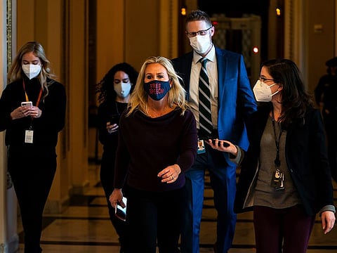 Rep. Marjorie Taylor Greene leaves after speaking on the House floor at the U.S. Capitol on Thursday, Feb. 4, 2021.