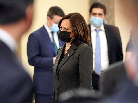 In this file photo taken on February 04, 2021 US Vice President Kamala Harris speaks to Senator Patrick Leahy (D-VT) after participating in a ceremonial swearing in photo op at the Old Senate Chamber at the the US Capitol in Washington, DC.