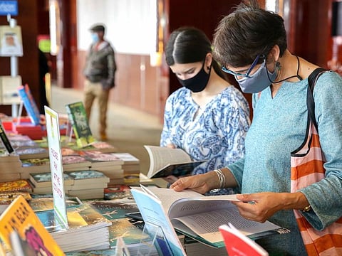 Visitors browse through books at Emirates Airline Festival of Literature in Dubai on Friday.