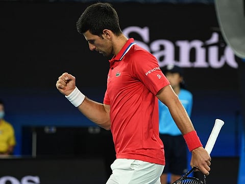 Novak Djokovic pumps himself up as he and Serbian teammate Nikola Cacic (not pictured) take on Germany's Jan-Lennard Struff and Alexander Zverev during their ATP Cup encounter in Melbourne on Friday.