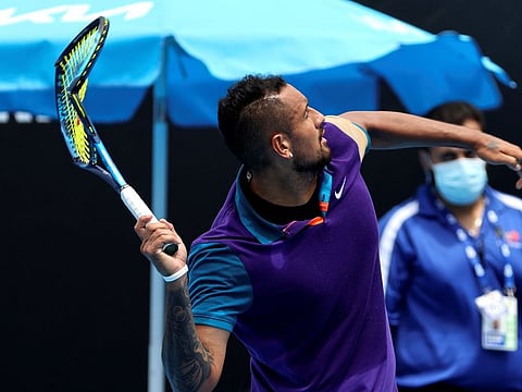 A frustrated Nick Kyrgios smashes his racket after losing a point against Croatia's Borna Coric during their Murray River Open match in Melbourne today. The Australian lost the warm-up match ahead of Australian Open.