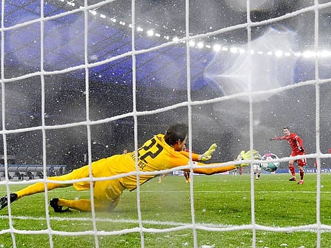 Bayern Munich's Robert Lewandowski saw his penalty saved but they German champions still defeated Hertha Berlin