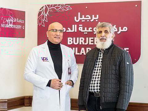 Dr Ali Keivanjah with the patient.
