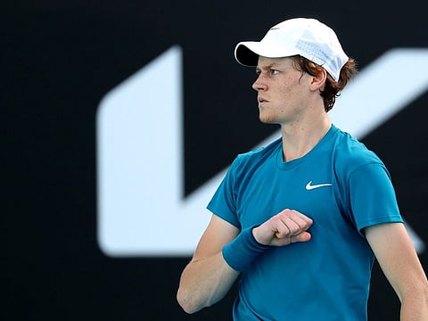 Italy's Jannik Sinner celebrates winning his final singles match against Italy's Stefano Travaglia