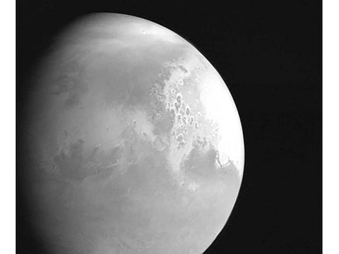 In this undated photo released by the China National Space Administration, a view of the planet Mars is captured by China's Tianwen-1 Mars probe from a distance of 2.2 million kilometres.
