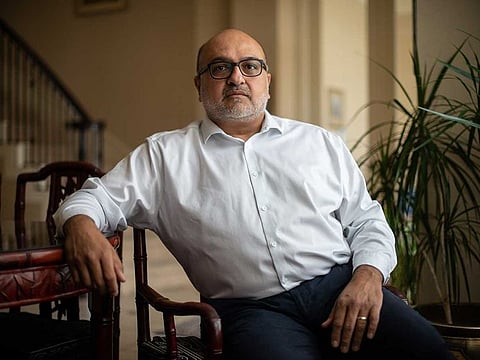 Dr Hasan Gokal, who was fired after distributing 10 vaccine doses after hours rather than letting them go to waste, at home in Sugar Land, Texas, Feb. 9, 2021. Though a judge dismissed the charges against Gokal as groundless, a district attorney vowed to present the matter to a grand jury, and Gokal says hospitals won't rehire him until the case is resolved.