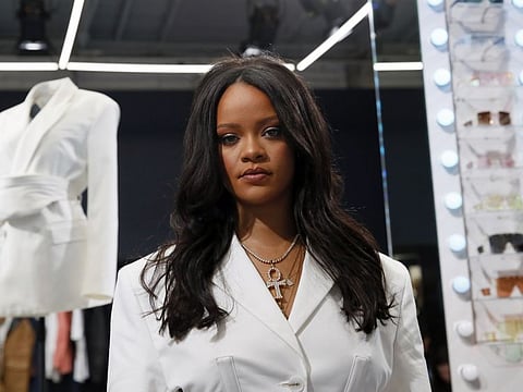 Rihanna poses as she unveils her first fashion designs for Fenty at a pop-up store in Paris, France, on May 22, 2019.