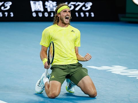 Greece's Stefanos Tsitsipas lets out a war cry after taming Australia's Thanais Kokkinakis in their marathon second round match in five sets at the Australian Open in Melbourne on Thursday.