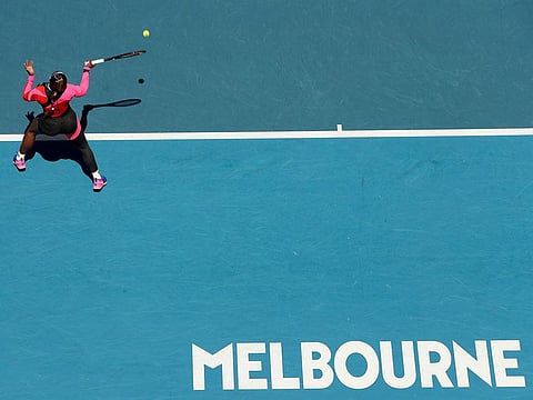 Serena Williams hits a return against Russia's Anastasia Potapova during their women's singles match on day five of the Australian Open tennis tournament in Melbourne on February 12, 2021.