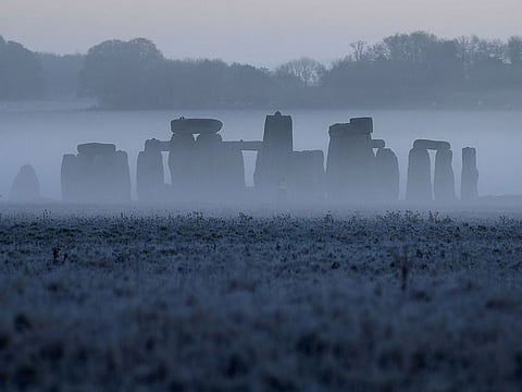 Stonehenge ancient stone circle is seen at dawn, near Amesbury, Wiltshire, Britain.