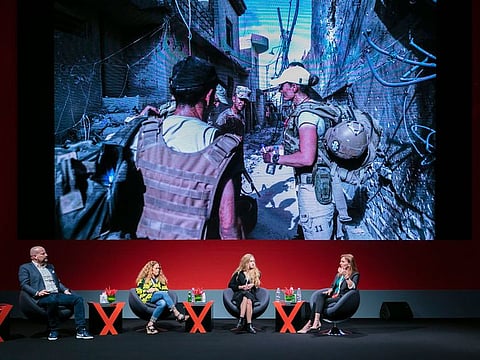 Photojournalists Paula Bronstein, Emma Francis and Claire Thomas share their personal and professional experiences at the Fifth Xposure International Photography Festival in Expo Center Sharjah today.