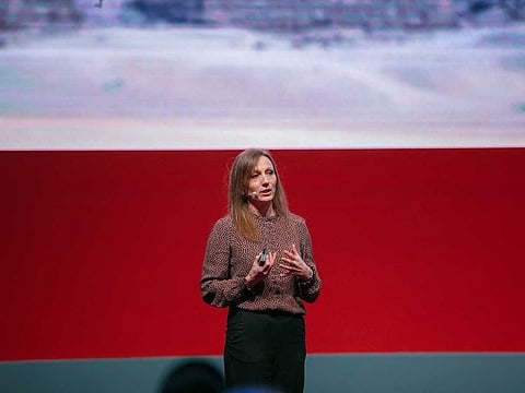 Welsh photographer Claire Thomas shows pictures taken by her from conflict zones at the Sharjah Xposure festival on Saturday.