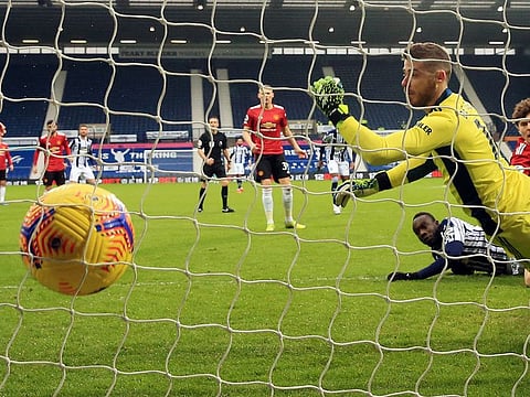West Bromwich Albion's Mbaye Diagne scores against Manchester United.