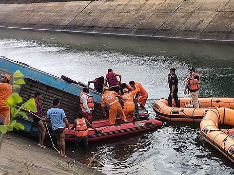 NDRF team carries out rescue operation after an overcrowded bus plunged into a canal in Sidhi district of Madhya Pradesh, on Tuesday.