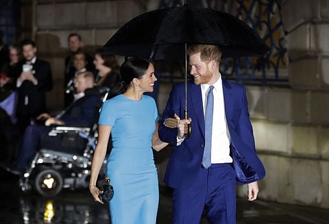 Britain's Prince Harry and Meghan arrive at the annual Endeavour Fund Awards in London, Thursday, March 5, 2020.