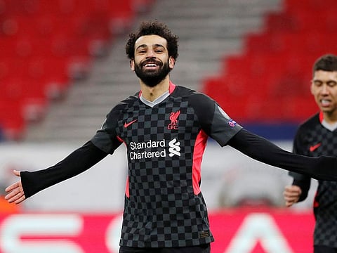 Liverpool's Mohamed Salah celebrates scoring their first goal.