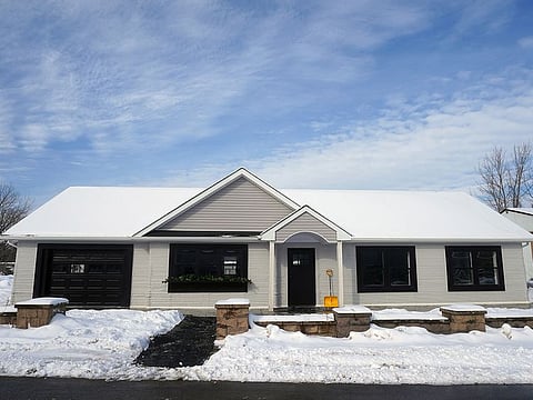 The outside of a proof of concept 3D printed house is pictured in Long Island, New York.