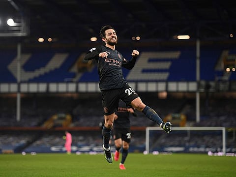 Manchester City's Bernardo Silva celebrates scoring his side's third goal against Everton.