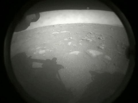 The first images arrive moments after NASA's Perseverance Mars rover spacecraft successfully touched down on Mars, at NASA's Jet Propulsion Laboratory in Pasadena, California, U.S. February 18, 2021.