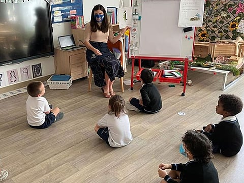 Natalie Clayton with a group of students