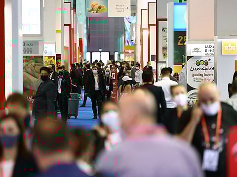How best to reach out to all those shoppers there? Food brands will have to refine or reinvent their strategies, with online being a key part of that. An image from the opening day of Gulfood 2021.