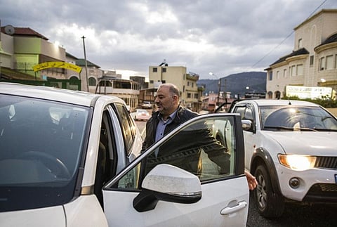 Mansour Abbas, an Islamist leader hoping to join the next Israeli government, in Daburiyya, an Arab village in northern Israel, during a campaign tour, February 18, 2021. Jewish politicians, including Prime Minister Benjamin Netanyahu, are courting Arab Israeli voters, and some Arab politicians are prepared to work with them.