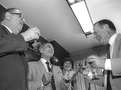 Outgoing Speaker of the  Knesset Menachem Savidor passes the gavel to Shlomo Hillel as acting Speaker Abba Eban looks on.