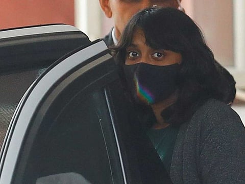 Disha Ravi, a 22-year-old climate activist, leaves after an investigation at National Cyber Forensic Lab, in New Delhi, India, February 23, 2021.