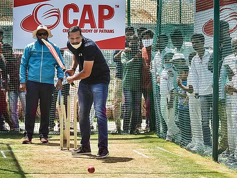 Former Indian cricketer Yusuf Pathan plays a shot during the inauguration of 26th Cricket Academy of Pathans (CAP), in Hyderabad, on Tuesday.