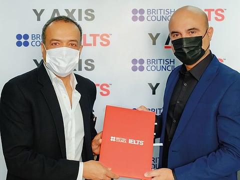 Xavier Augustin, Founder and CEO, Y-Axis, and Deep Adhikari, Director Exams Gulf South Cluster, British Council, at the signing of the computer delivered test centre at Y-Axis