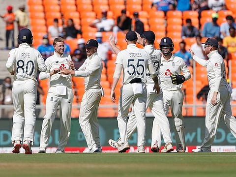 England players celebrate a dismissal during 2nd day of the 3rd Test vs India at Narendra Modi Stadium, Motera in Ahmedabad on Thursday.