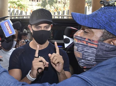 Bollywood actor Hrithik Roshan arrives at Crime Intelligence Unit (CIU) to record a statement in a case he registered against Kangana Ranaut in 2016 involving alleged e-mail exchanges, in Mumbai, Saturday, Feb. 27, 2021.