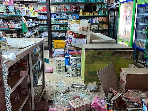 the damage on a grocery shop in Jazan, Saudi Arabia, after a military projectile launched by Yemen's rebel Houthis fell early Tuesday, March 2, 2021.
