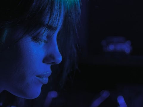 This image released by Apple TV+ shows Billie Eilish in a scene from "Billie Eilish: The World’s A Little Blurry."