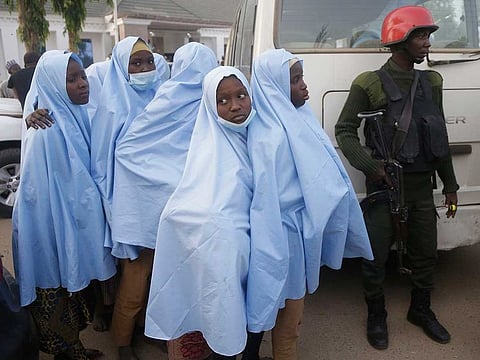 Some of the students who were abducted by gunmen from the Government Girls Secondary School, in Jangebe, last week wait for a medical checkup after their release meeting with the state Governor Bello Matawalle, in Gusau, northern Nigeria, Tuesday, March 2, 2021.