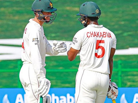 Zimbabwe skipper and centurion Sean Williams (left) and Regis Chakabva during their crucial 75-run partnership against Afghanistan on Wednesday.