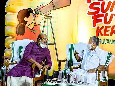 Kerala Chief Minister Pinarayi Vijayan and Finance Minister Thomas Isaac (left) during a seminar on 'Youth Summit on Future Kerala' in Thiruvananthapuram, Sunday, Feb 28, 2021.